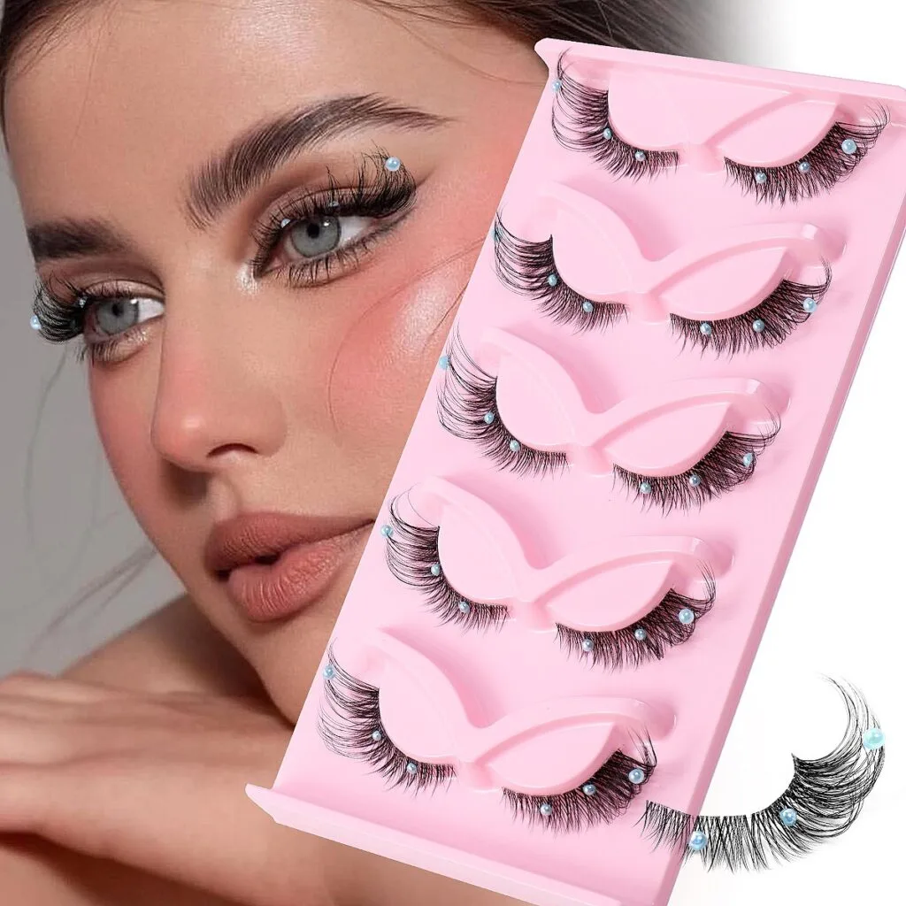 5 Pairs of Foxy Winged 3D Strip Lashes with clear band showing the dramatic cat eye volume for cosmetic eye makeup.
